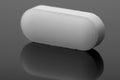 White pill, tablet with copy space on black background. Royalty Free Stock Photo