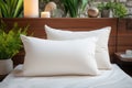 White pillow mockup of a bed in the hotel bedroom Royalty Free Stock Photo