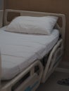 White pillow on Patient bed in ward room hospital without patient Royalty Free Stock Photo