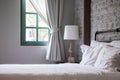 White pillows and blanket on bed in the morning shine Royalty Free Stock Photo
