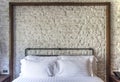 White pillows on a classic bedroom with white brick wall Royalty Free Stock Photo