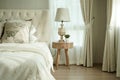 White pillows setting on English country style bedding Royalty Free Stock Photo