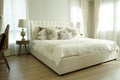 White pillows setting on English country style bedding