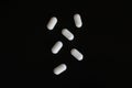 Pills on a black background. Royalty Free Stock Photo