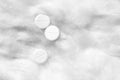 White pills on medical cotton wool. White abstract background Royalty Free Stock Photo