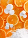 White pills with oranges Royalty Free Stock Photo