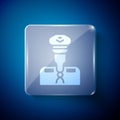 White Pilot icon isolated on blue background. Square glass panels. Vector
