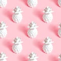 White pineapple tropical fruit repeat seamless pattern on light pastel pink background for wrapping paper. Royalty Free Stock Photo