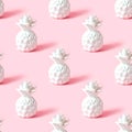White pineapple tropical fruit repeat seamless pattern on light pastel pink background for wrapping paper. Royalty Free Stock Photo