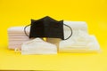 White, pink and black surgical masks for protection against Coronavirus COVID-19 SARS-CoV-2 Royalty Free Stock Photo