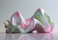 A white, pink and green abstract sculpture