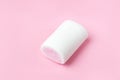 White-pink marshmallows placing on pink flatlay. Marshmallow pastel colors on pink background Royalty Free Stock Photo