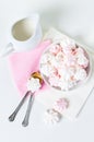 White and pink meringues