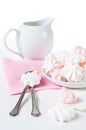 White and pink meringues