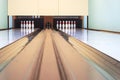 White pins in bowling alley lane,  Fun and game Royalty Free Stock Photo