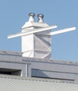 White pipe on the roof of the house