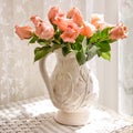White Pitcher with Peach Roses Royalty Free Stock Photo