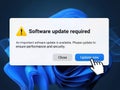 White pixelated computer cursor hand clicking the \'update now\' button on a critical \'software Royalty Free Stock Photo