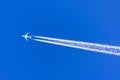 White plane big two engines aviation airport contrail clouds. Royalty Free Stock Photo