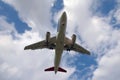 White plane and clouds