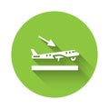 White Plane landing icon isolated with long shadow. Airplane transport symbol. Green circle button. Vector Royalty Free Stock Photo
