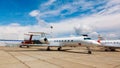 White plane on the platform Royalty Free Stock Photo