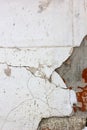 White plaster over grey concrete wall - texture for background. Royalty Free Stock Photo