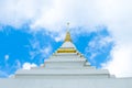 White pagoda punctuate and golden.