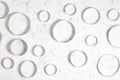 A white plastered wall with abstract circles