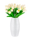 White plastic artificial tulips with green leaves in silver vase isolated on white background. Tulip flower decoration