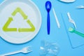 White plastic on a blue background. Plastic pollution. Recycling plastic, reusable packing, sorting garbage concept. Zero waste,