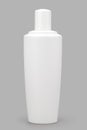 White plastic bottle for sanitizer, isolate on a gray background Royalty Free Stock Photo