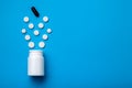 White plastic bottle and white tablets. Royalty Free Stock Photo