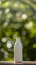 White plastic bottle on wooden surface with bokeh background, eco-friendly packaging concept Royalty Free Stock Photo