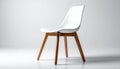 Side View of a Modern White Plastic Chair with Natural Wood Legs on a White Background image Royalty Free Stock Photo