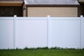 White plastic fence for back yard protection and privacy