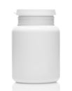 White plastic medical bottle without label, clean and new, container for pills, tablets, vitamins, drugs, capsules, medicament and Royalty Free Stock Photo