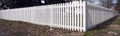 White plastic picket fence