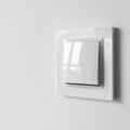 A white plastic power switch in an apartment on a white wall Royalty Free Stock Photo