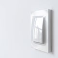 A white plastic power switch in an apartment on a white wall Royalty Free Stock Photo