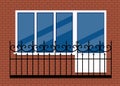 White plastic pvc window with door and balcony with black metal balcony rail, front view. isolated on a red brown brick wall Royalty Free Stock Photo