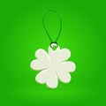 White plastic shamrock leaf tag