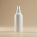 White plastic spray bottle with a cylindrical shape, set on a neutral beige background. It Royalty Free Stock Photo