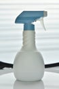 White plastic sprayer with blue head Royalty Free Stock Photo