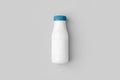 White plastic yogurt or milk bottle mockup with blank label Royalty Free Stock Photo