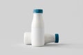 White plastic yogurt or milk bottle mockup with blank label Royalty Free Stock Photo