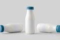 White plastic yogurt or milk bottle mockup with blank label Royalty Free Stock Photo