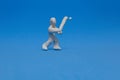 A white plasticine doll practicing baseball Royalty Free Stock Photo