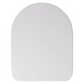 White plastick modern closed toilet seat lid isolated on white background top view Royalty Free Stock Photo