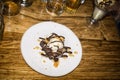 White plate with chocolate brownie ice cream dessert Royalty Free Stock Photo